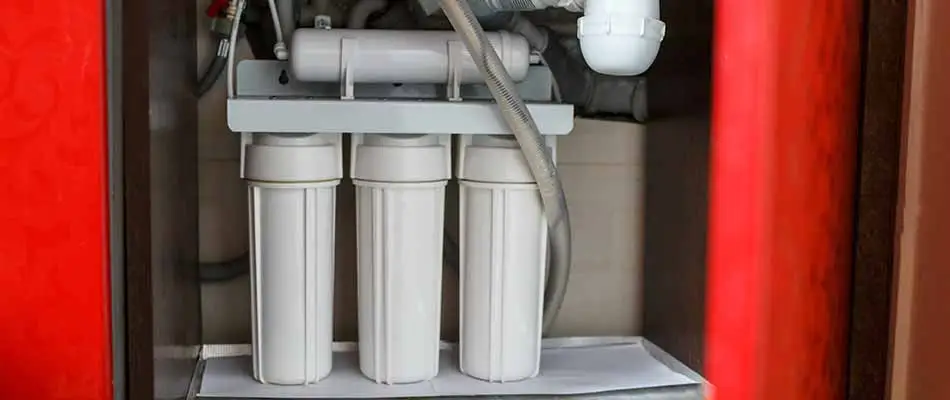 Under-sink water filtration system in a Winter Haven, FL home.
