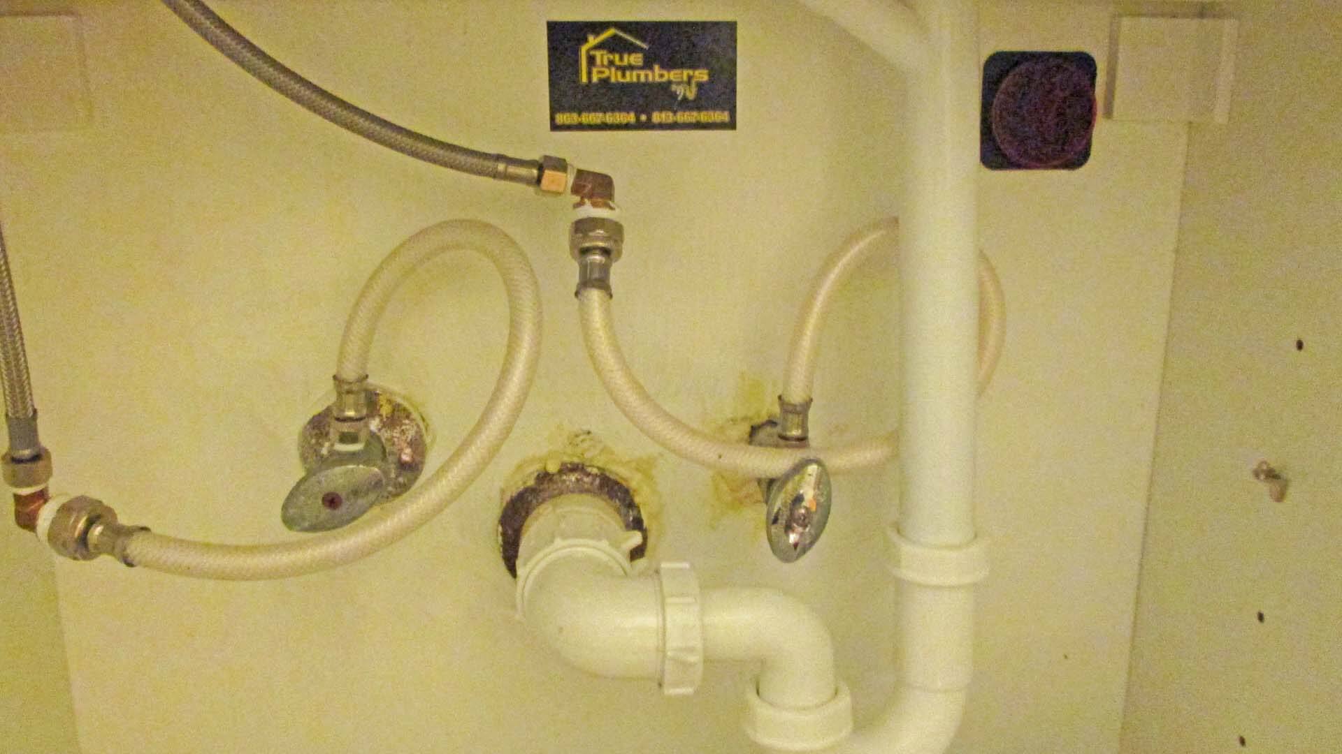 True Plumbers & AC doing a repiping job in kitchen of Davenport, FL home.